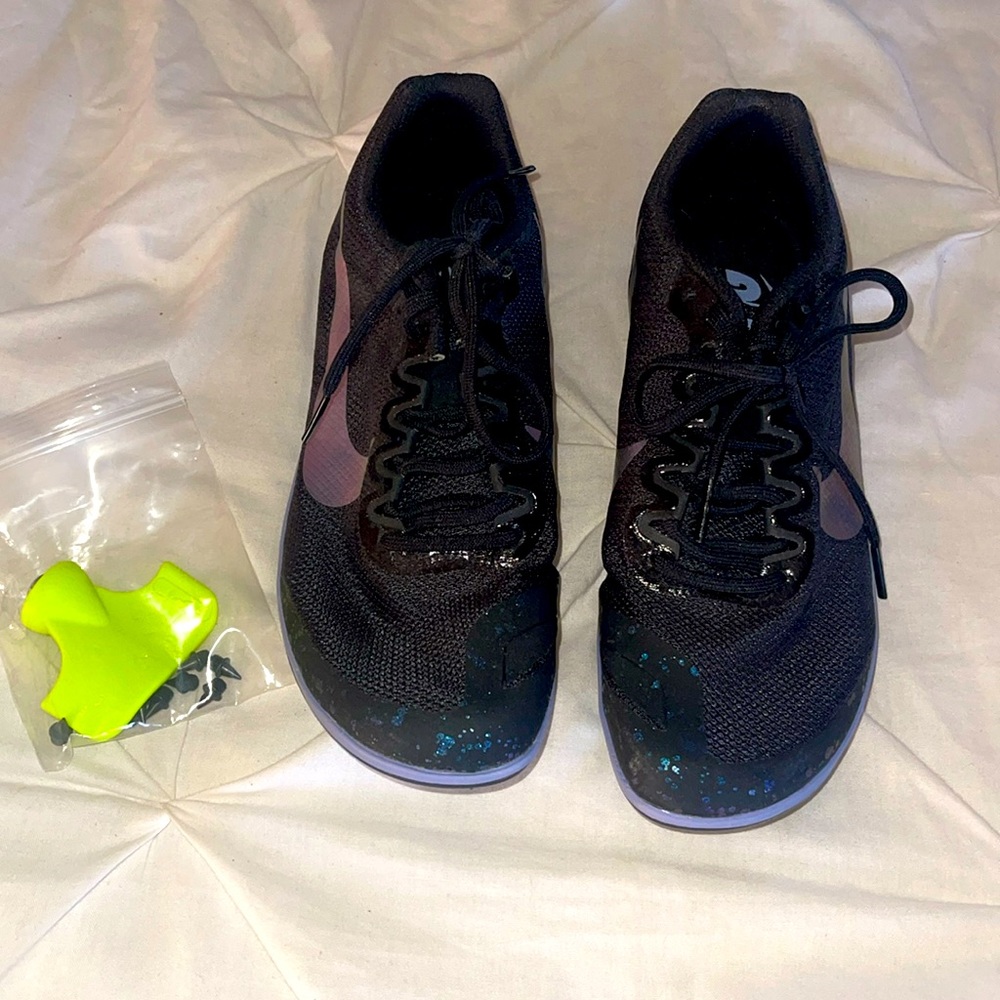 Track shoes with spikes